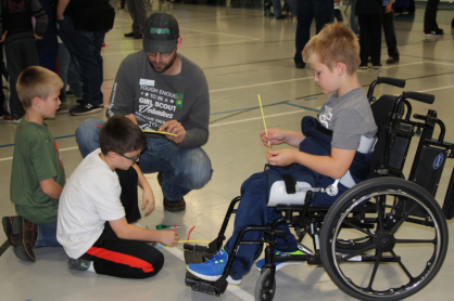 Children playing with an instructor.